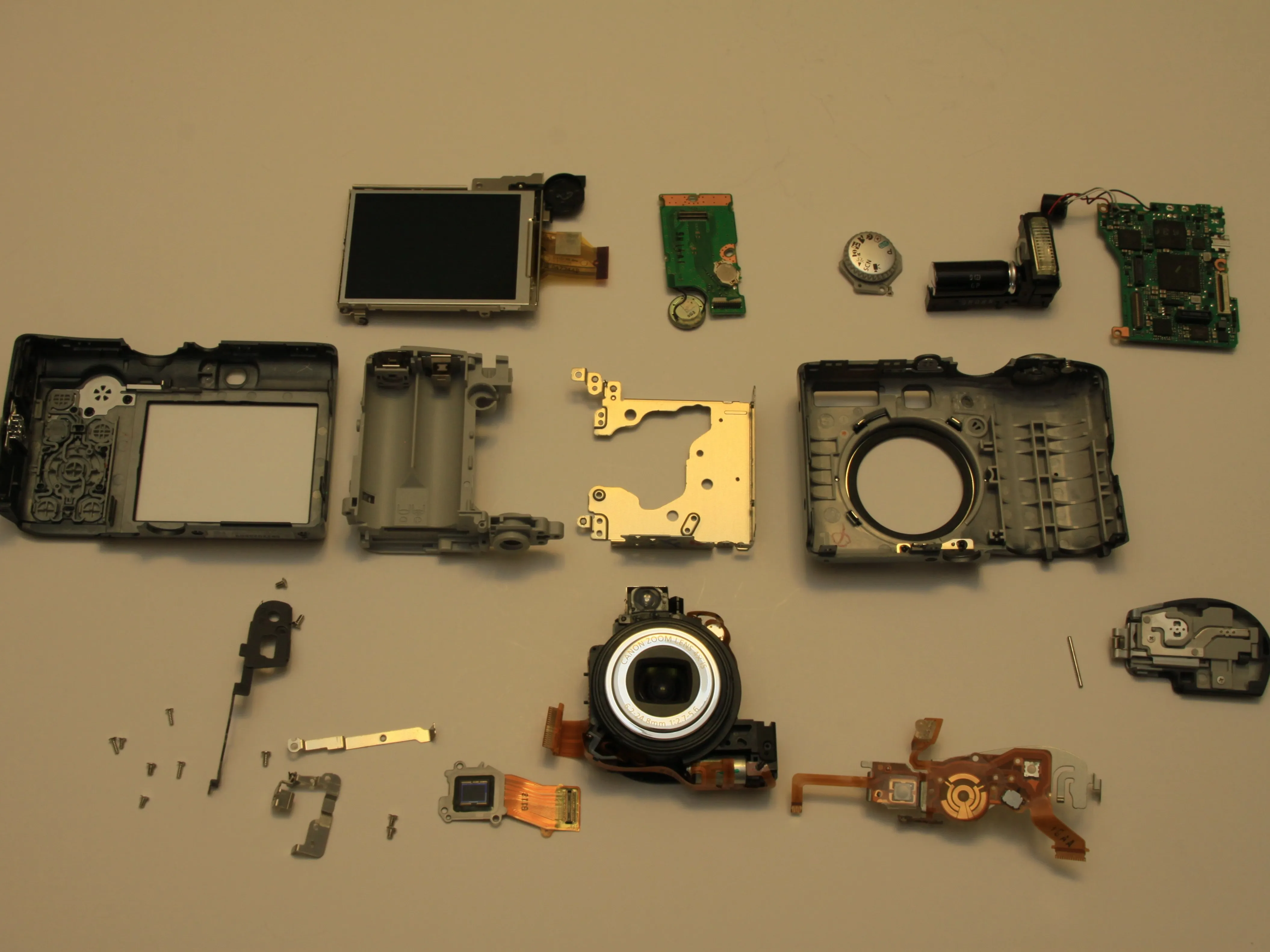 Canon PowerShot A1000 IS Teardown, Canon PowerShot A1000 IS Teardown: шаг 1, изображение 1 из 1