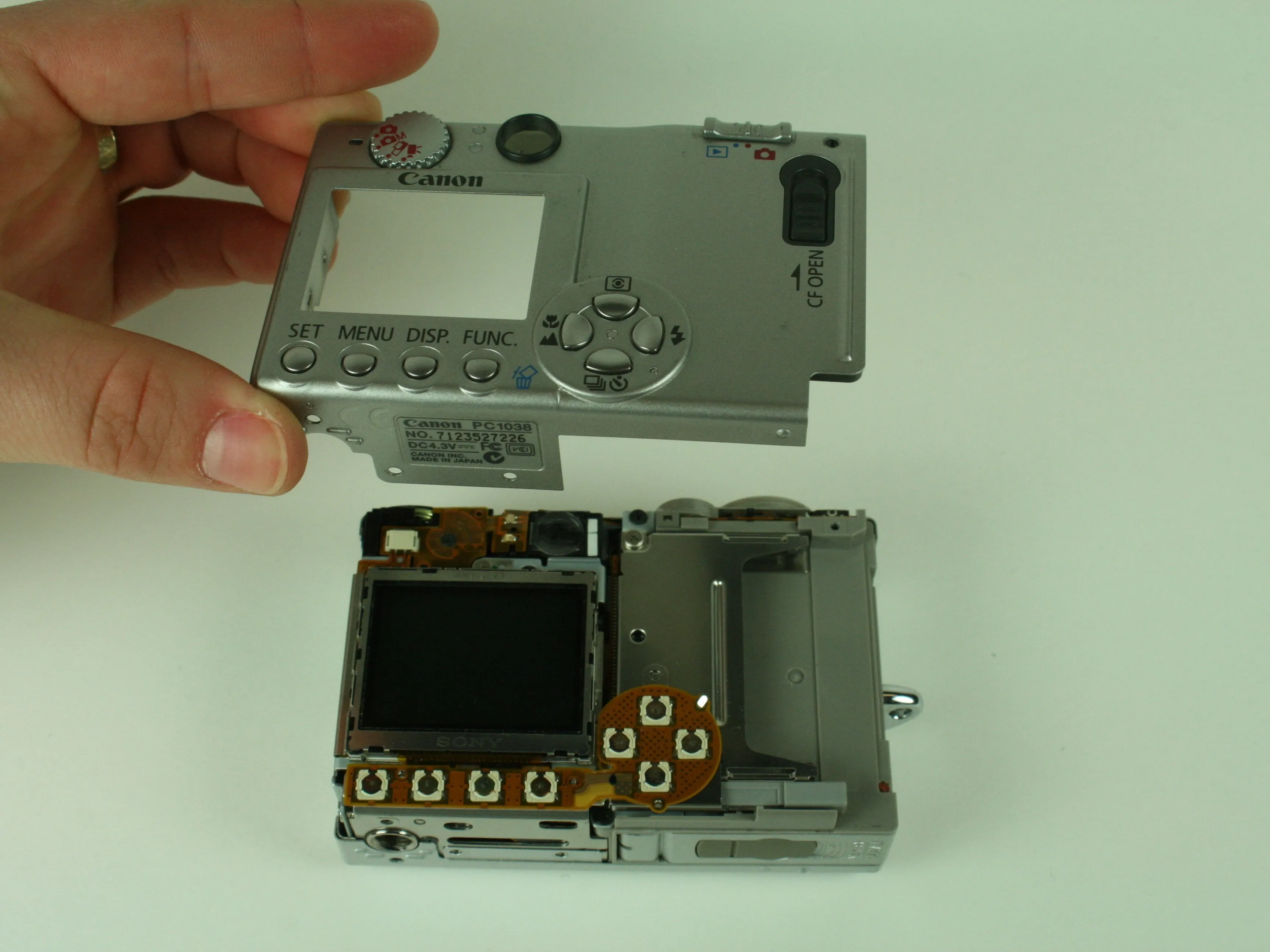 Canon PowerShot S400 Teardown: шаг 4, изображение 1 из 2