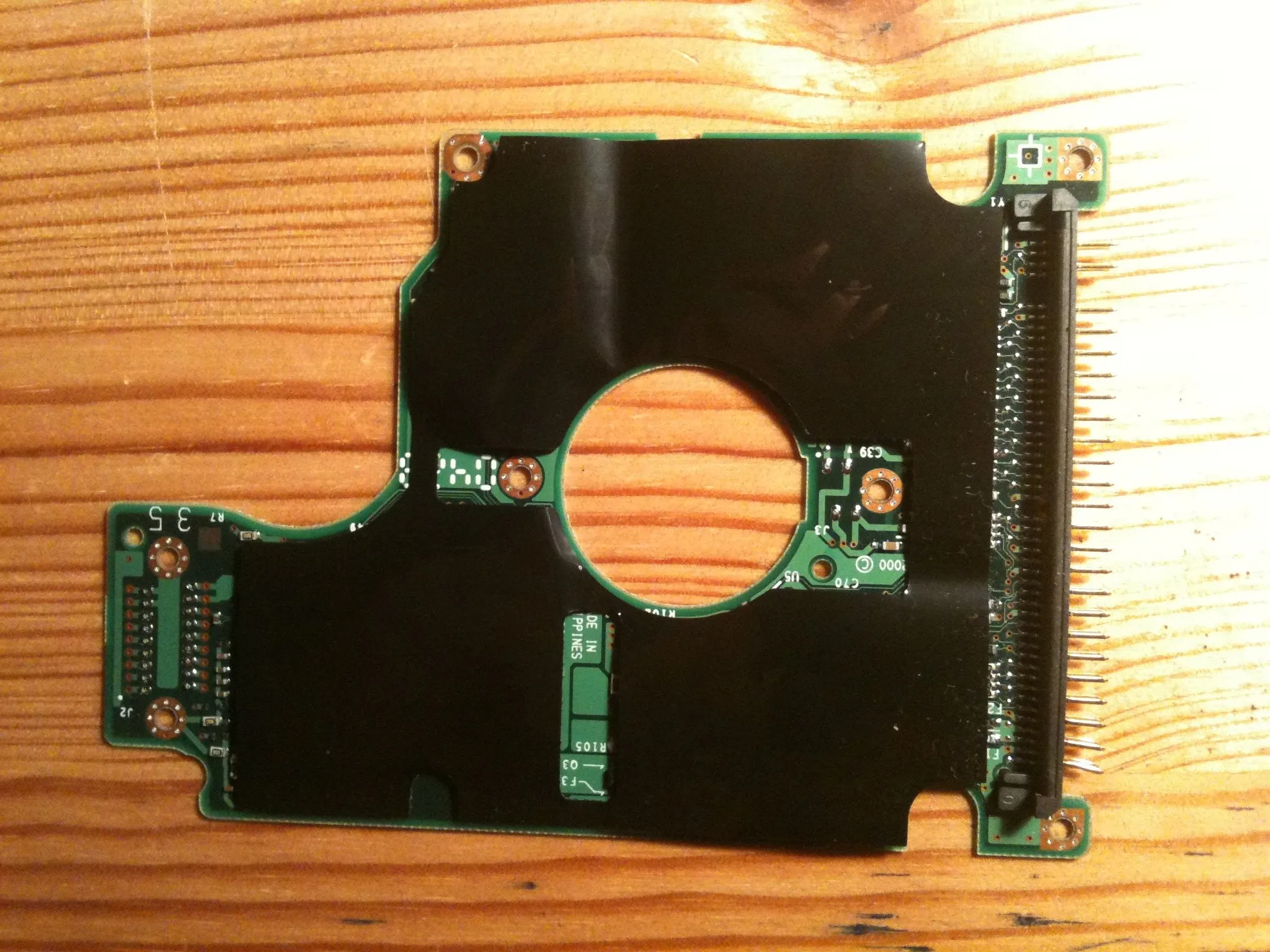 IBM Travelstar DJSA-220 2.5'' Hard Drive Teardown, Taking off the Logic Board: step 3, image 2 of 3