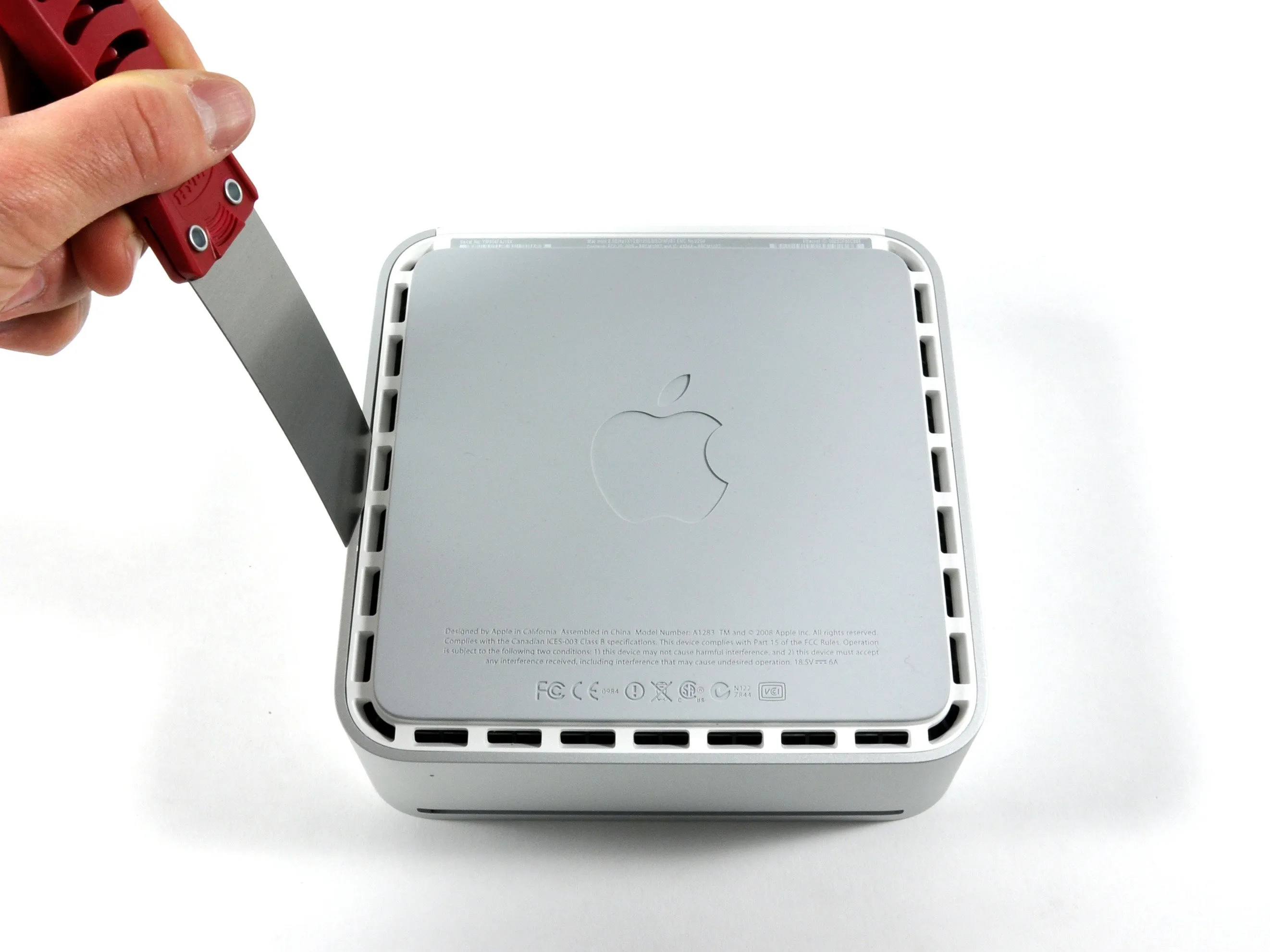 Разборка Mac mini модели A1283: шаг 3, изображение 1 из 3