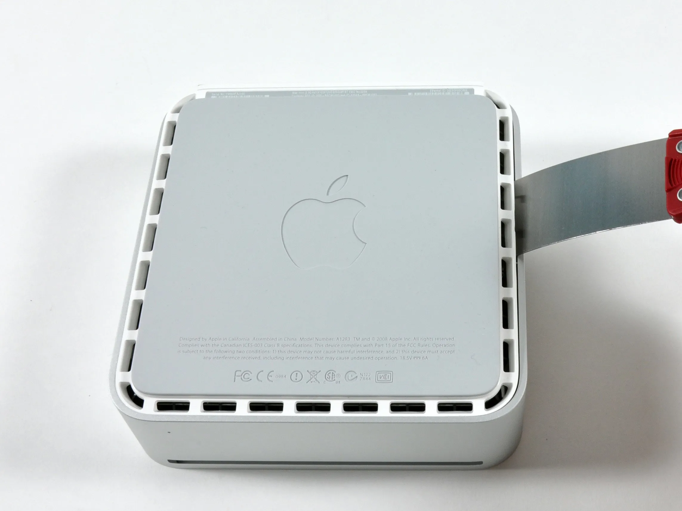 Разборка Mac mini модели A1283: шаг 4, изображение 1 из 3