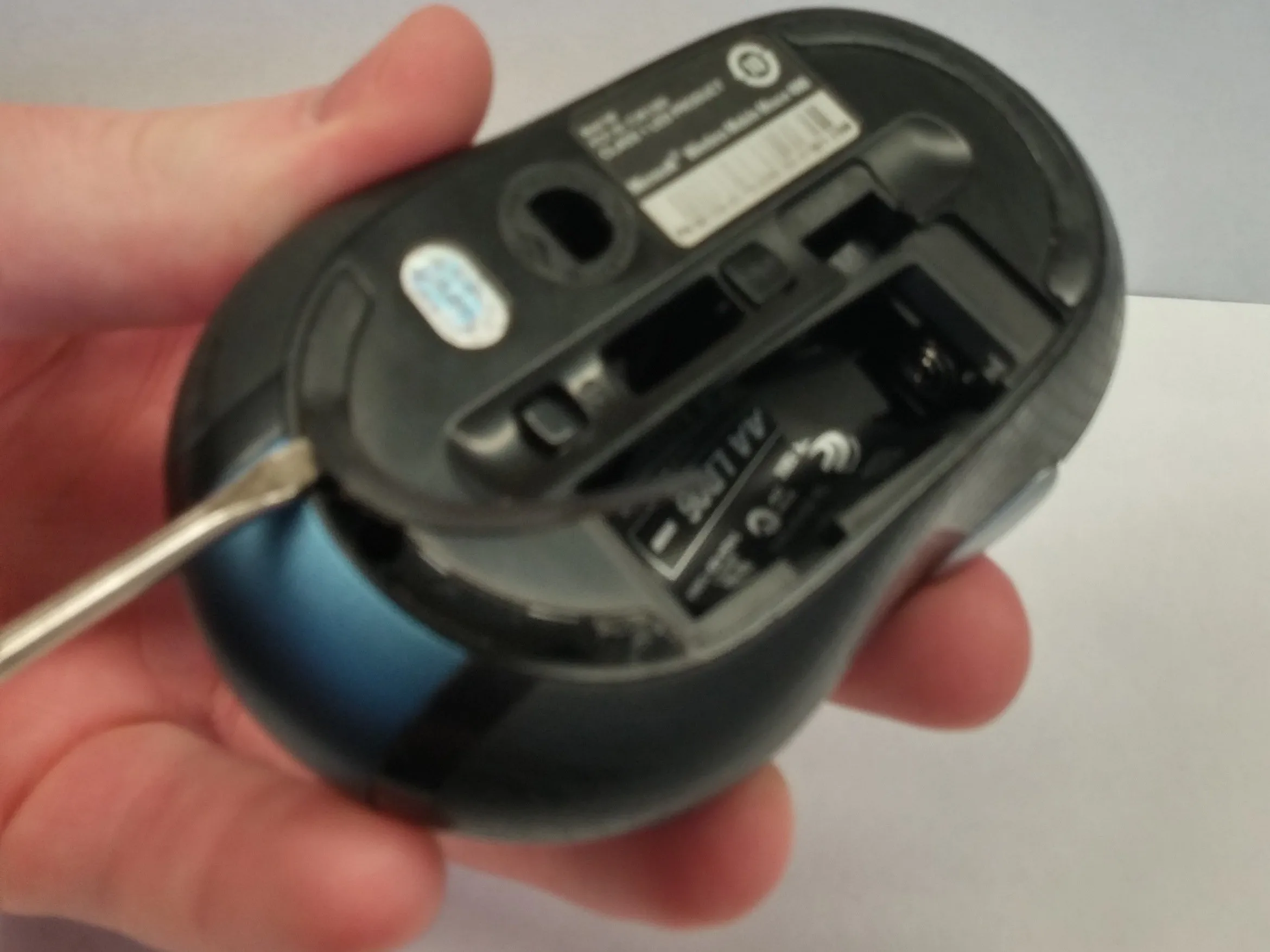 Microsoft Wireless Mobile Mouse 4000 Teardown, Remove Bottom Rubber Traction: step 2, image 1 of 3