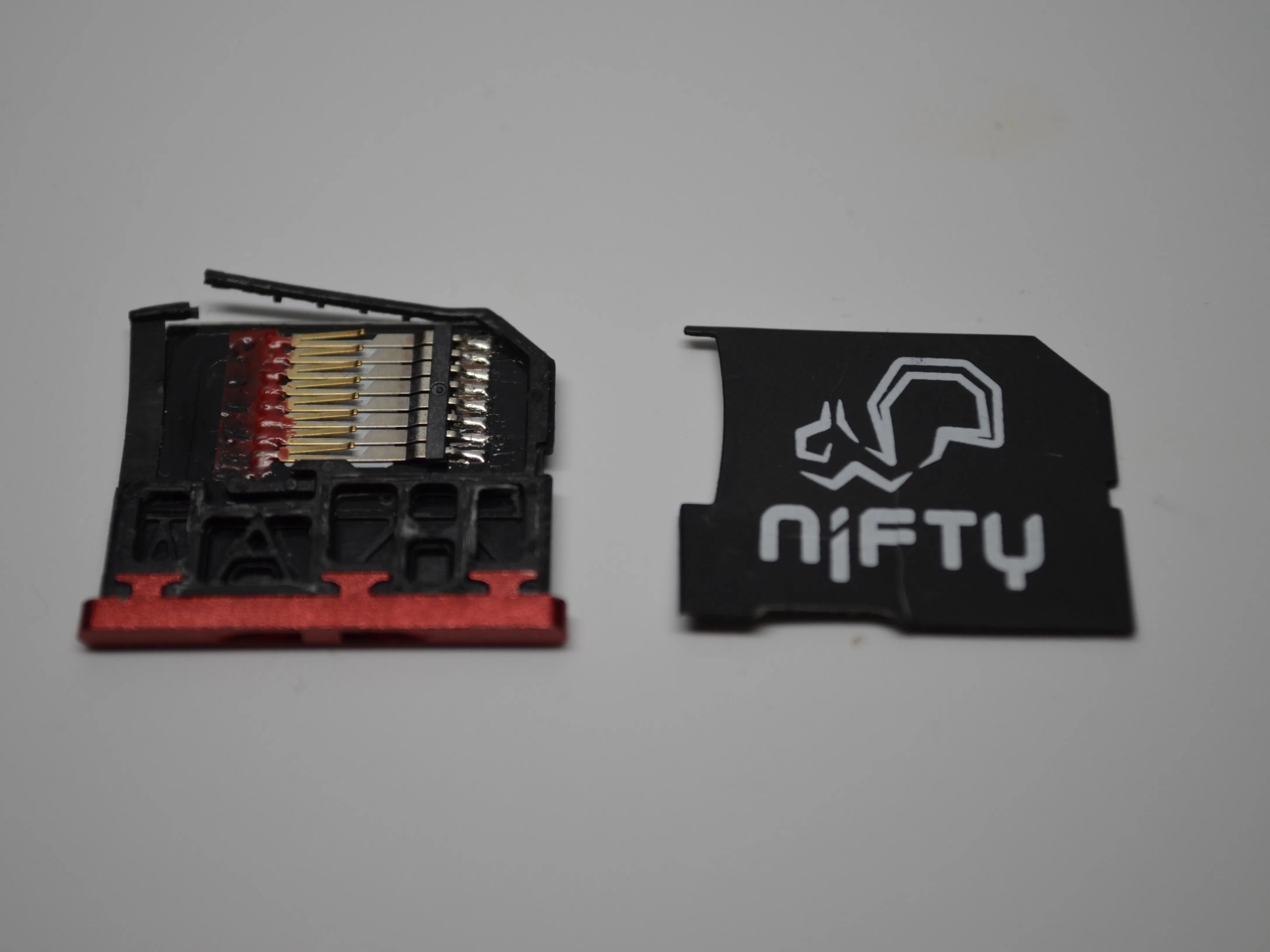 Nifty MiniDrive и TarDisk MiniDrive Teardown, Nifty card teardown cont...: шаг 2, изображение 2 из 3