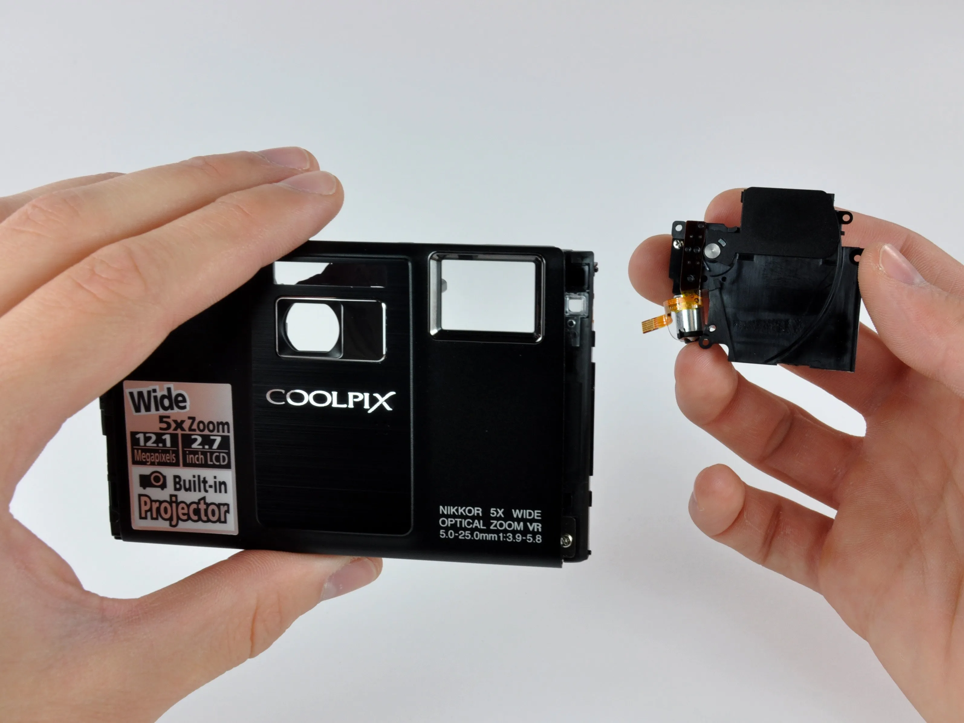 Nikon Coolpix S1000pj Teardown: шаг 17, изображение 1 из 3