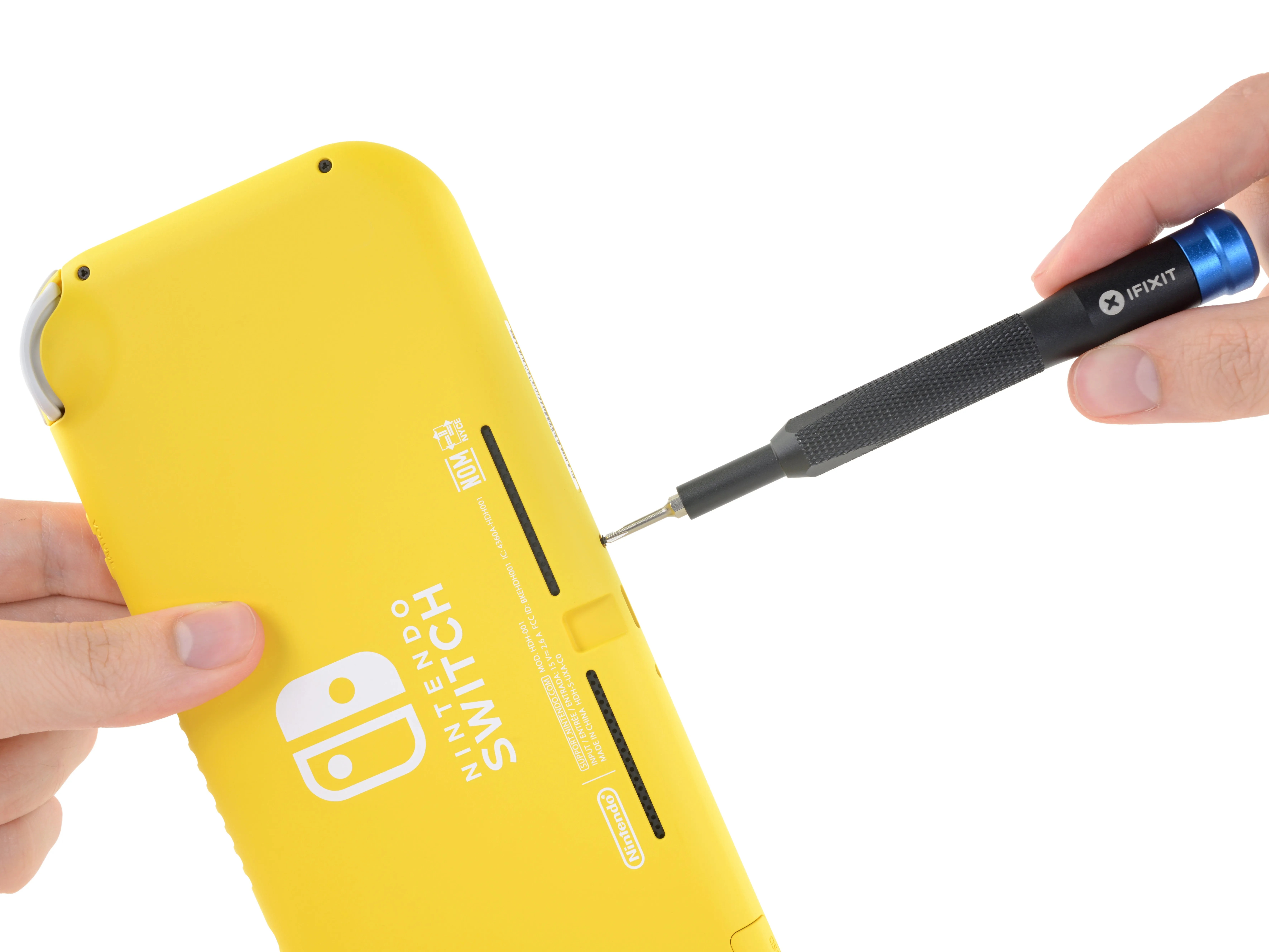 Разборка Nintendo Switch Lite: шаг 4, изображение 1 из 3