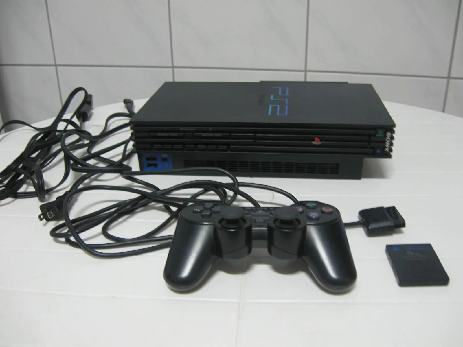 Разборка PlayStation 2: шаг 2, изображение 2 из 2