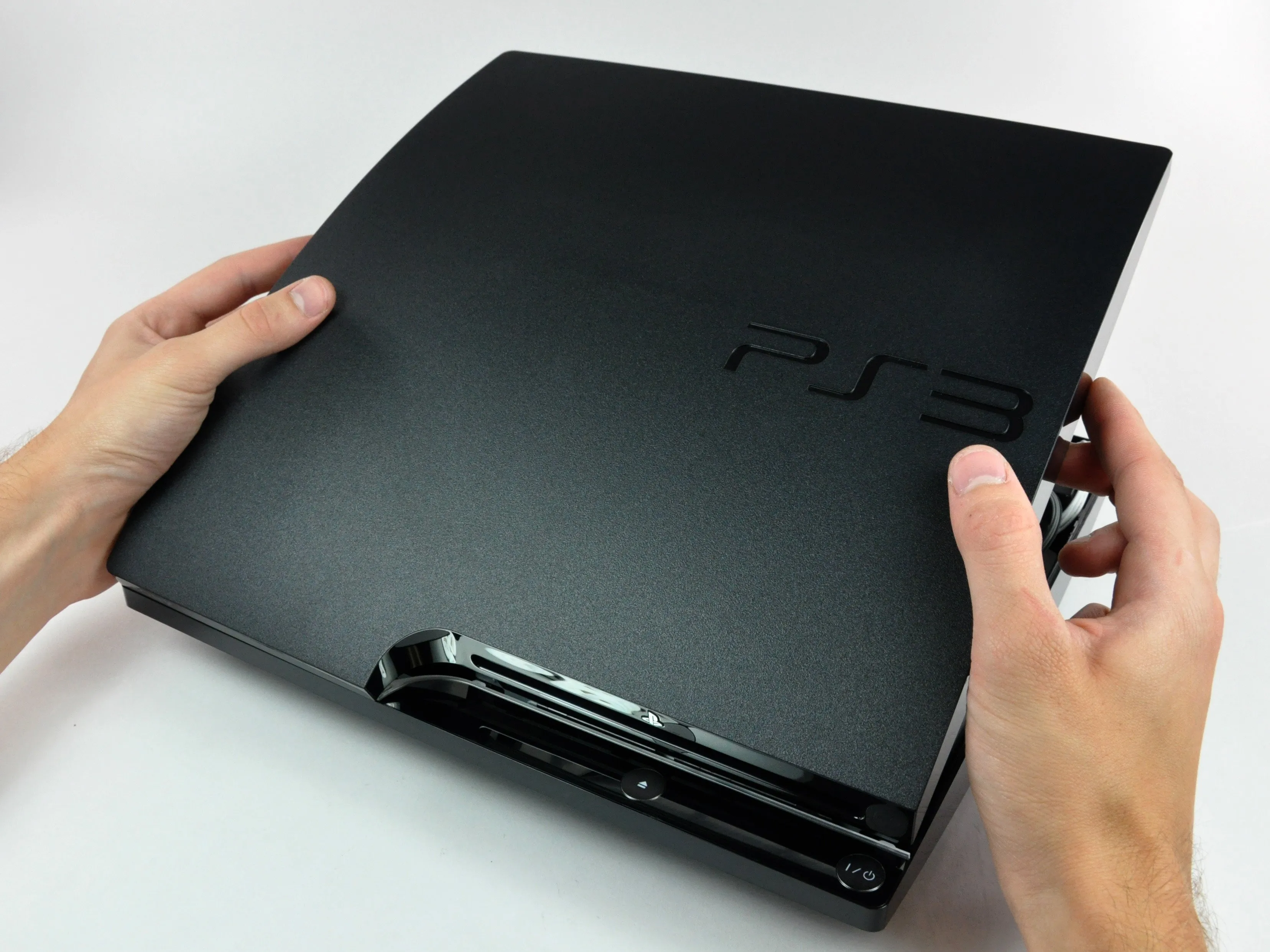 Разборка PlayStation 3 Slim: шаг 9, изображение 1 из 3