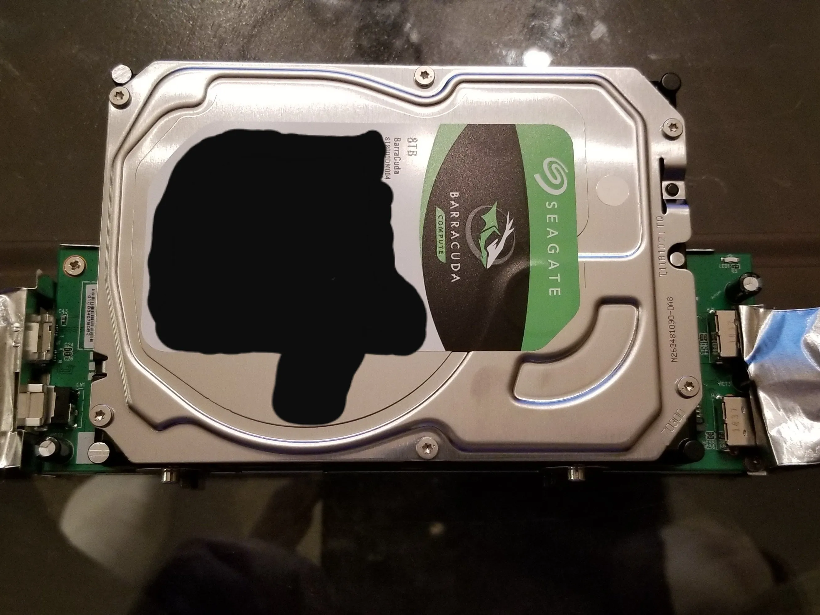 Разборка Seagate Backup Plus Hub, удаление алюминиевой ленты: шаг 10, изображение 1 из 1