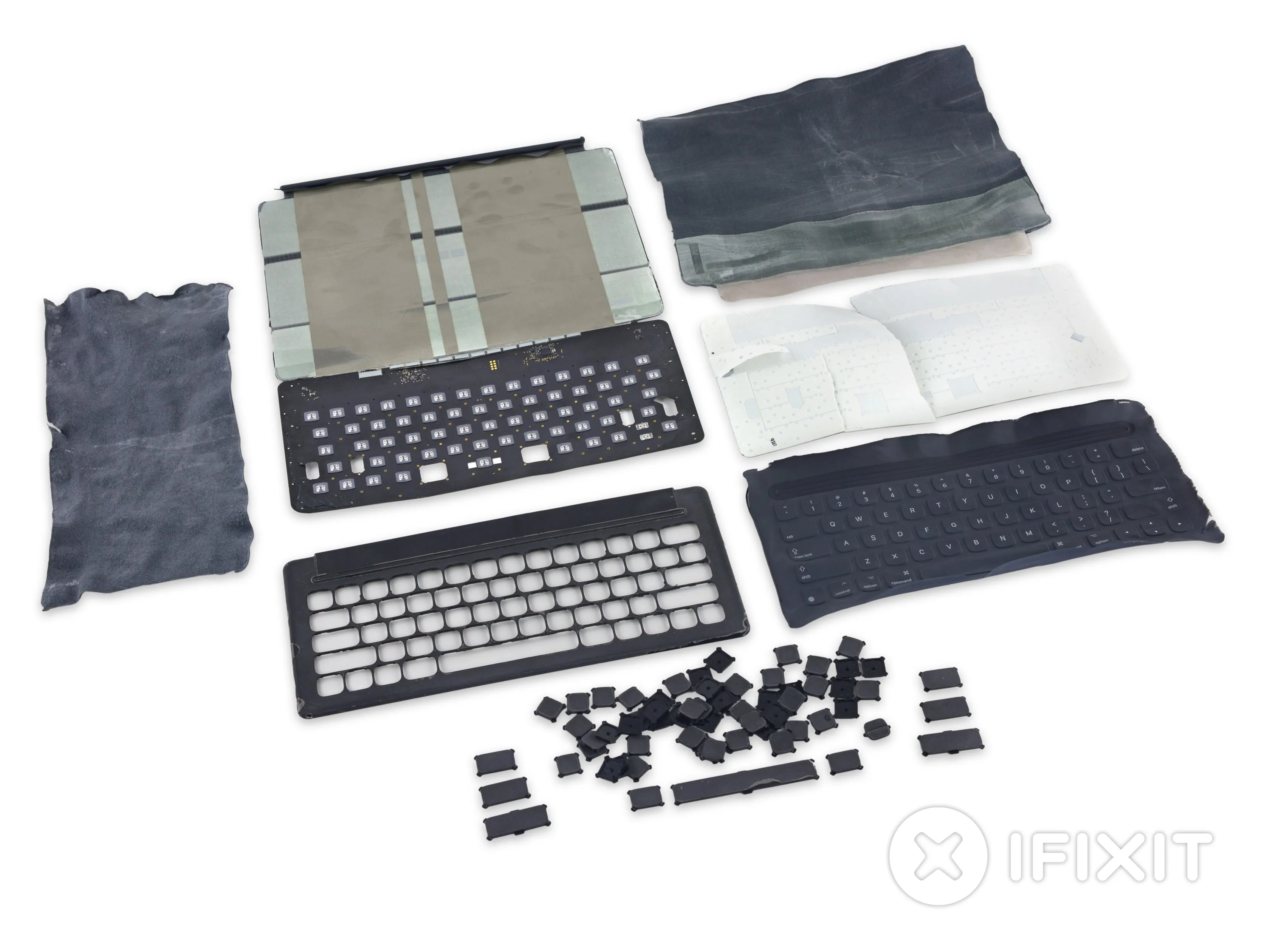 Разборка клавиатуры Smart Keyboard: шаг 11, изображение 1 из 2